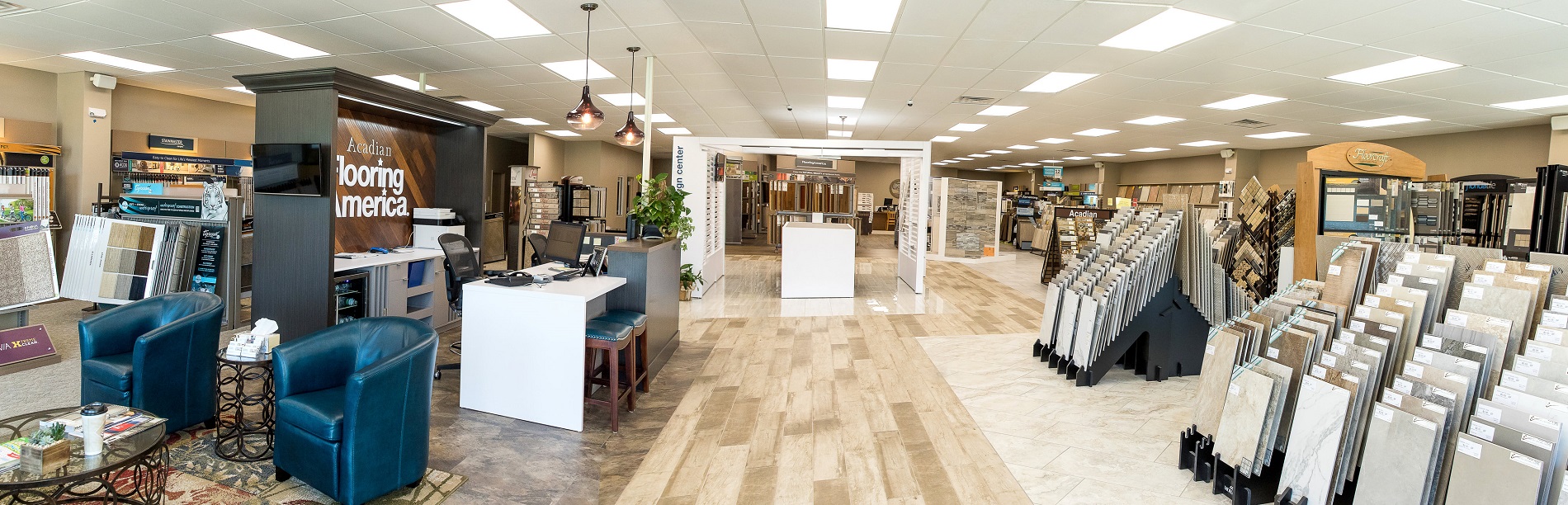 Women holding flooring sample in floor store 