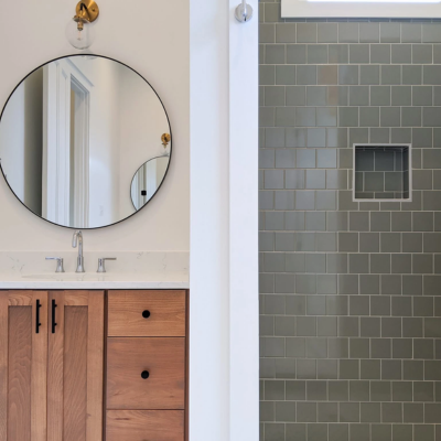 Walk-in shower with large-format porcelain tile in Jefferson Parish