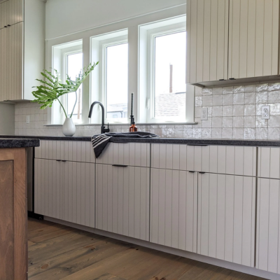Decorative kitchen backsplash completed by Acadian Flooring America